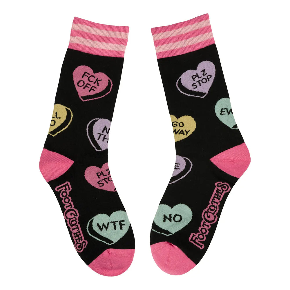 
                      
                        A pair of socks with some sweary love slogans. Black legs, pink heel, toe and cuff. 
                      
                    