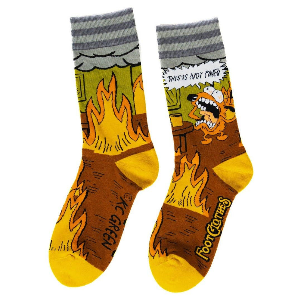 
                      
                        A pair of socks featuring a design by KC Green. Brown flaming legs, yellow heel, toe and cuff. 
                      
                    