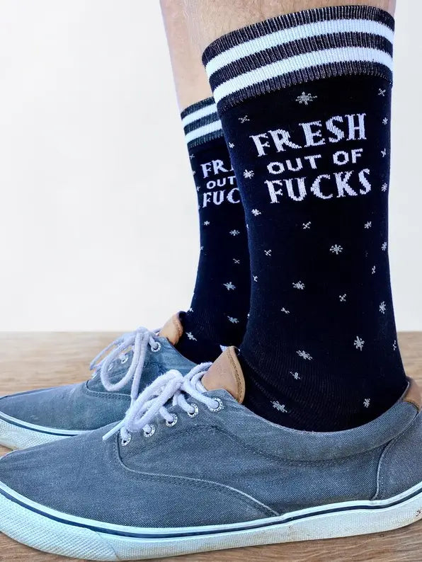 
                  
                    Fresh out of F**ks Socks. A pair of socks with a bold slogan and simple black and purple stars design. Purple toes, heel and cuff.
                  
                