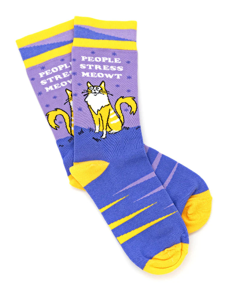 
                  
                    People Stress Meowt Socks. A pair of socks featuring a bold slogan and cat motif with bight blue legs, yellow cuff, heel and tow.
                  
                