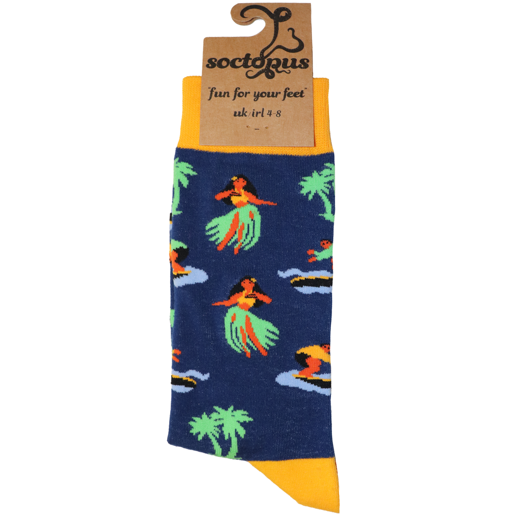 
                      
                        A pair of socks depicting hula girls and surfers. Blue legs, yellow cuff, heel and toe. In soctopus packaging.
                      
                    