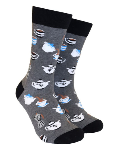 A pair of socks depicting tea cups and tea pots. Grey legs, black cuff, heel and toe.