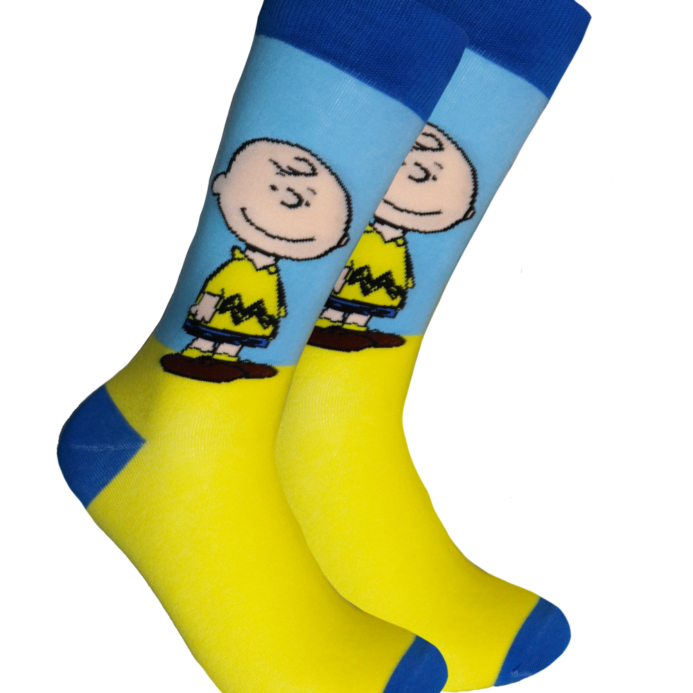 Peanuts Socks - Charlie Brown. A pair of socks depicting the iconic Charlie Brown. Blue and Yellow legs, dark blue cuff, heel and toe.
