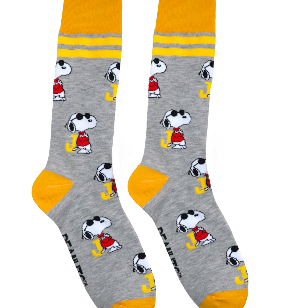 A pair of socks depicting Snoopy as Joe Cool. Grey legs, yellow cuff, heel and toe.